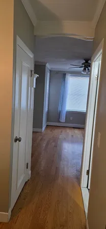 a bathroom with a toilet and a bathtub