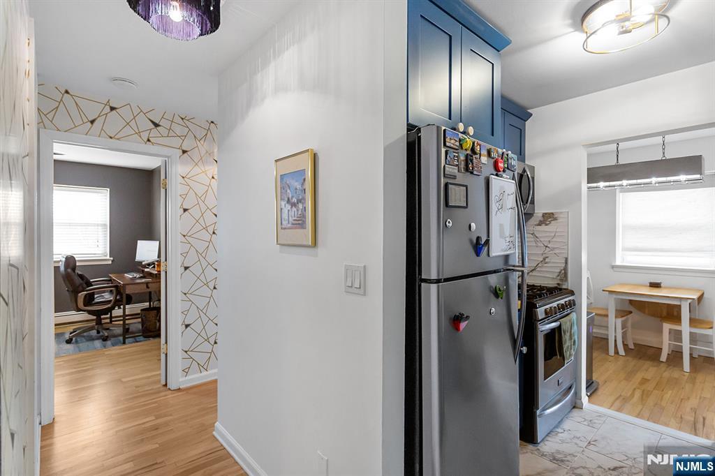 25 River Road, Unit B11 Nutley, NJ 07110 - Photo 14 of 30 a view of a livingroom with wooden floor