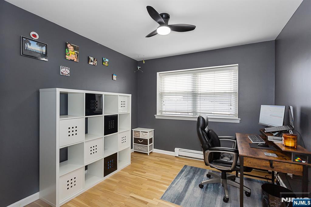 25 River Road, Unit B11 Nutley, NJ 07110 - Photo 21 of 30 a view of a workspace with furniture and a window