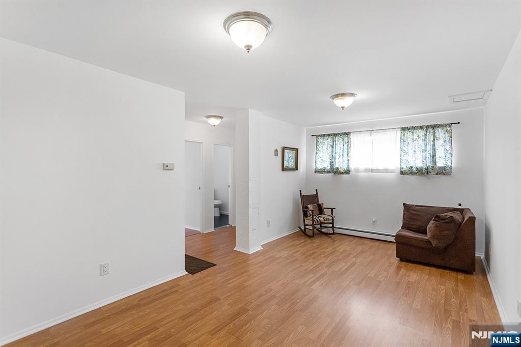 25 River Road, Unit B11 Nutley, NJ 07110 - Photo 24 of 30 an empty room with furniture and windows