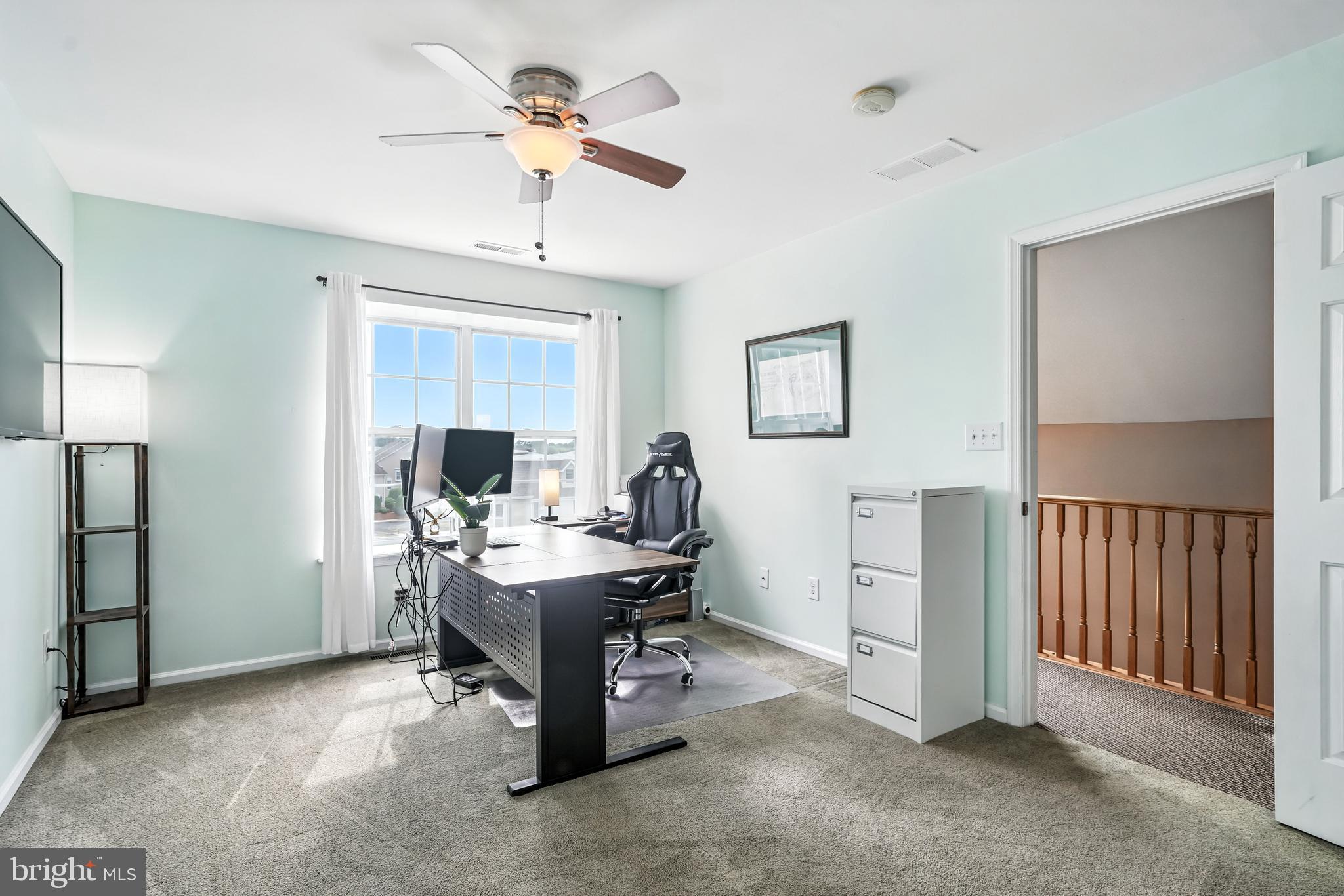 1501 Deborah Court, Unit 2102 Jamison, PA 18929 - Photo 13 of 21 a view of a workspace with furniture and a window