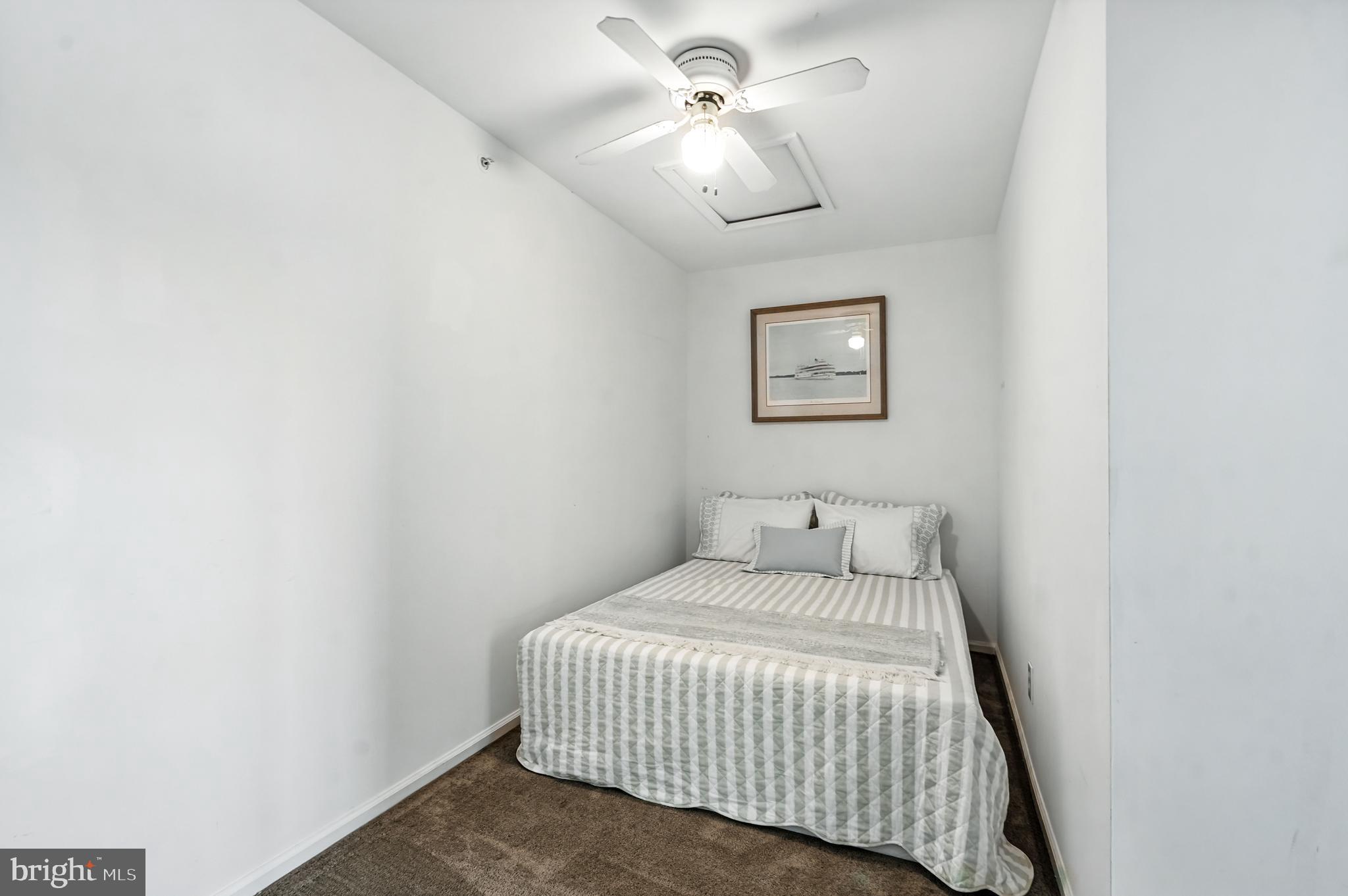 1501 Deborah Court, Unit 2102 Jamison, PA 18929 - Photo 15 of 21 a bedroom with a bed and a wall painting