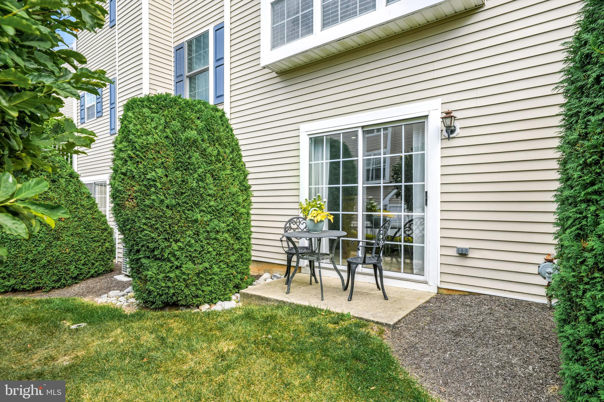 1501 Deborah Court, Unit 2102 Jamison, PA 18929 - Photo 18 of 21 a garden view with a outdoor seating