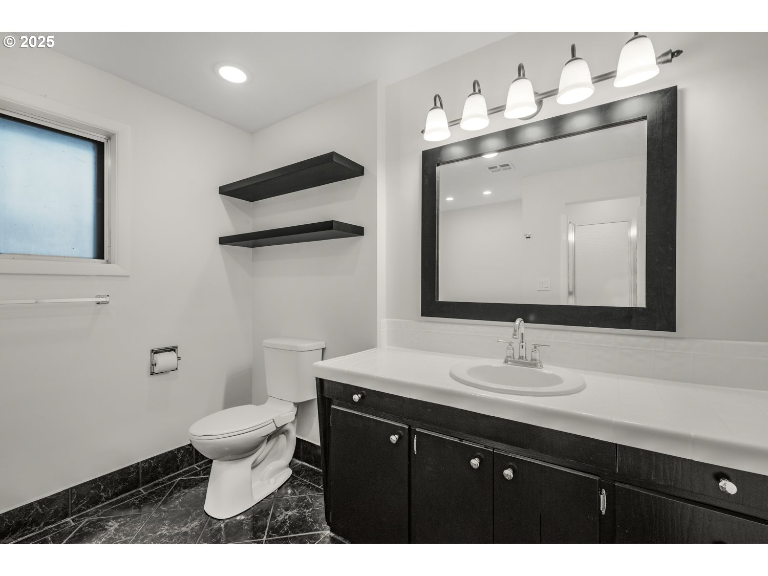 4160 Cordon Road Northeast Salem, OR 97305 - Photo 25 of 43 a bathroom with a toilet sink and mirror
