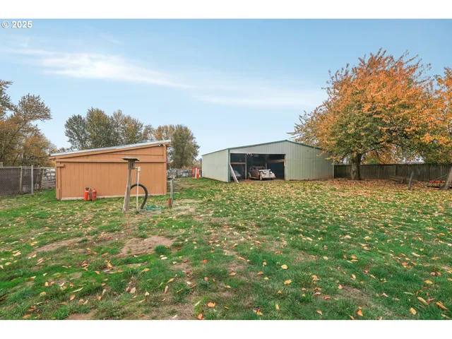 a backyard of a house with lots of green space