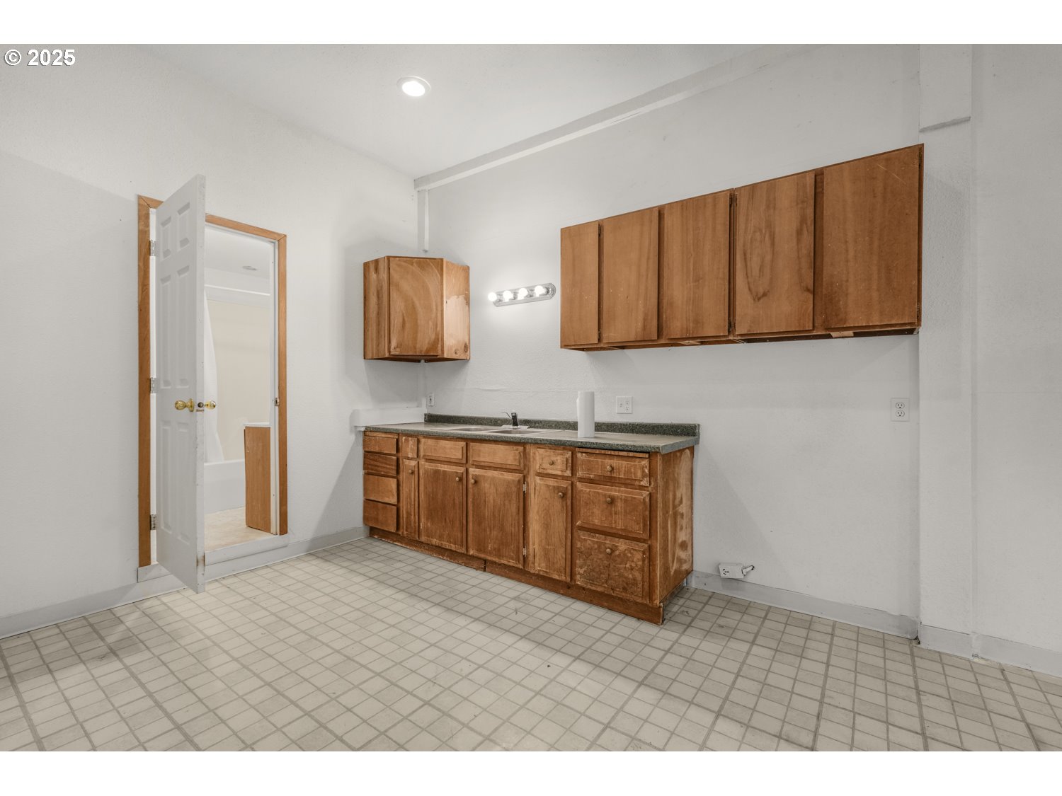 4160 Cordon Road Northeast Salem, OR 97305 - Photo 38 of 43 a kitchen with stainless steel appliances granite countertop a stove a sink and a refrigerator with wooden floor