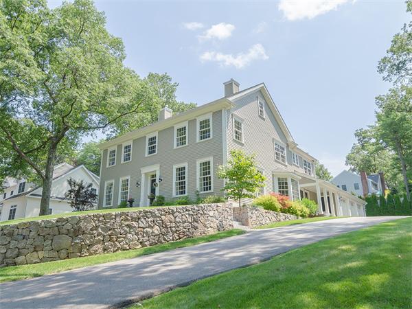 79 Pilgrim Road Wellesley, MA 02481 - Photo 1 of 30 a front view of a house with a garden