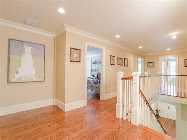 79 Pilgrim Road Wellesley, MA 02481 - Photo 17 of 30 a view of a livingroom with furniture wooden floor and kitchen