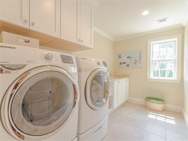 79 Pilgrim Road Wellesley, MA 02481 - Photo 18 of 30 a utility room with sink dryer and washer