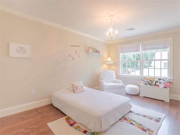79 Pilgrim Road Wellesley, MA 02481 - Photo 19 of 30 a spacious bedroom with a bed and window