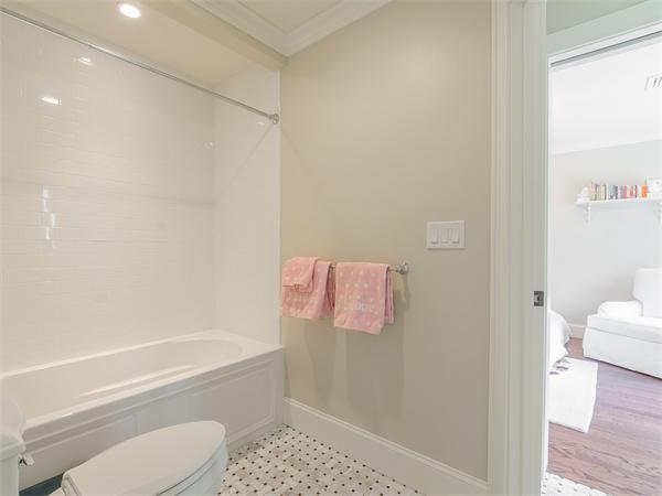 79 Pilgrim Road Wellesley, MA 02481 - Photo 21 of 30 a bathroom with a toilet and shower