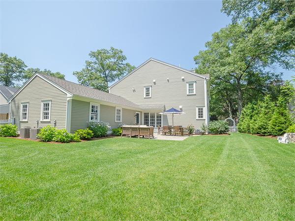 79 Pilgrim Road Wellesley, MA 02481 - Photo 4 of 30 a view of a house with a yard and porch