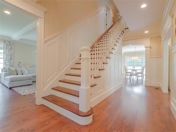 79 Pilgrim Road Wellesley, MA 02481 - Photo 8 of 30 a view of entryway with wooden floor and stairs
