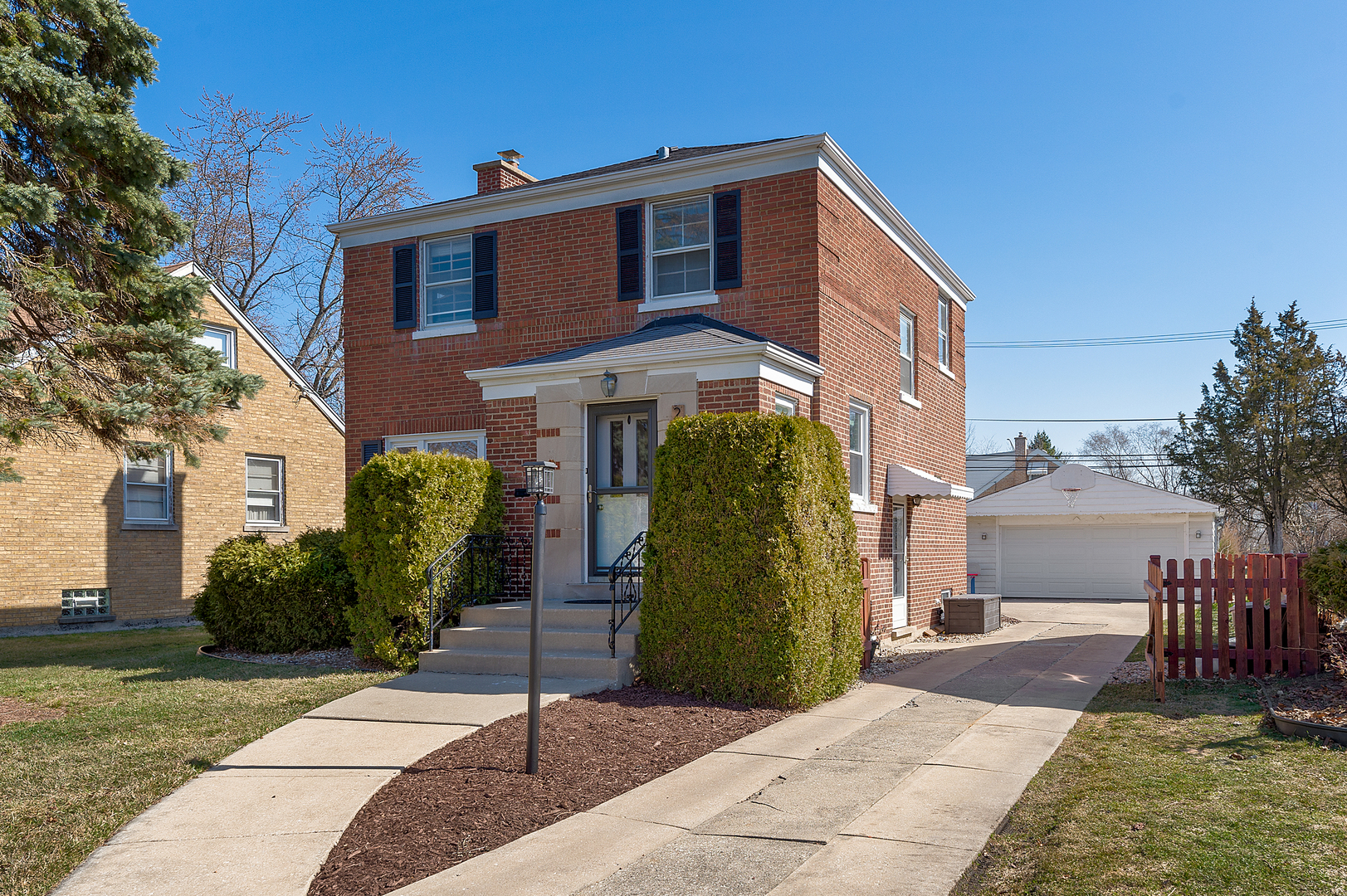 2309 2nd Avenue North Riverside, IL 60546 - Photo 2 of 22 a front view of a house with a garden