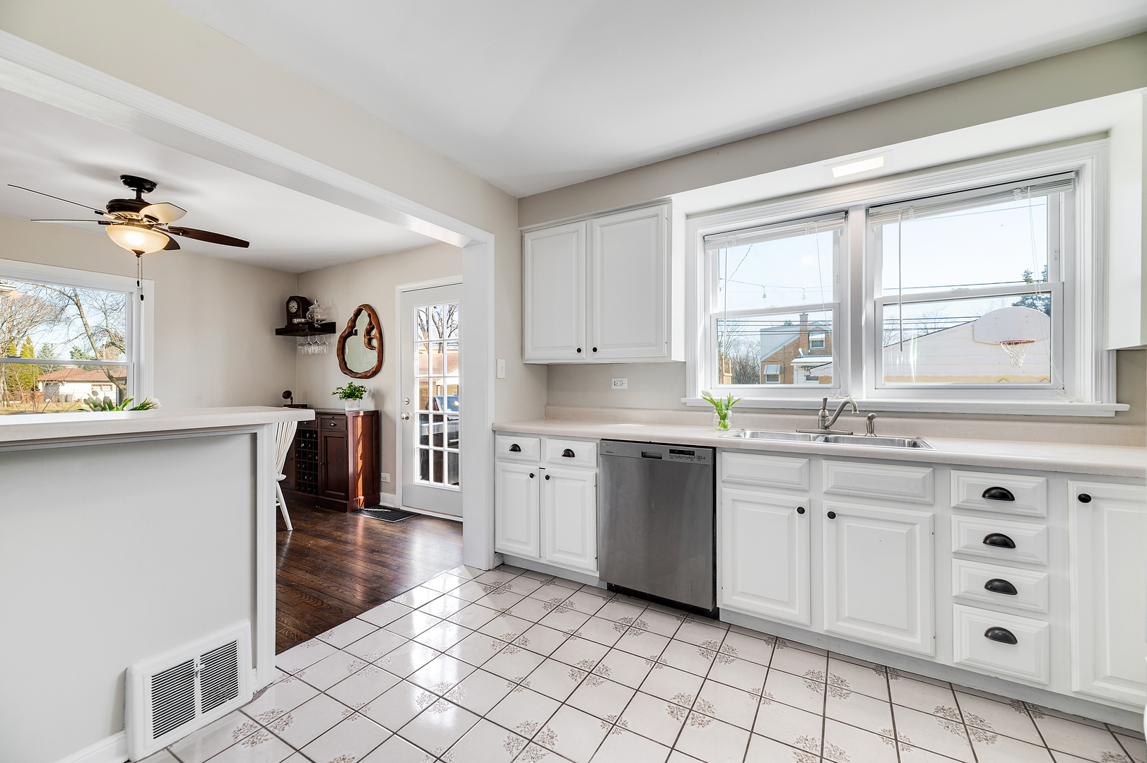 2309 2nd Avenue North Riverside, IL 60546 - Photo 11 of 22 a kitchen with granite countertop a sink cabinets and window