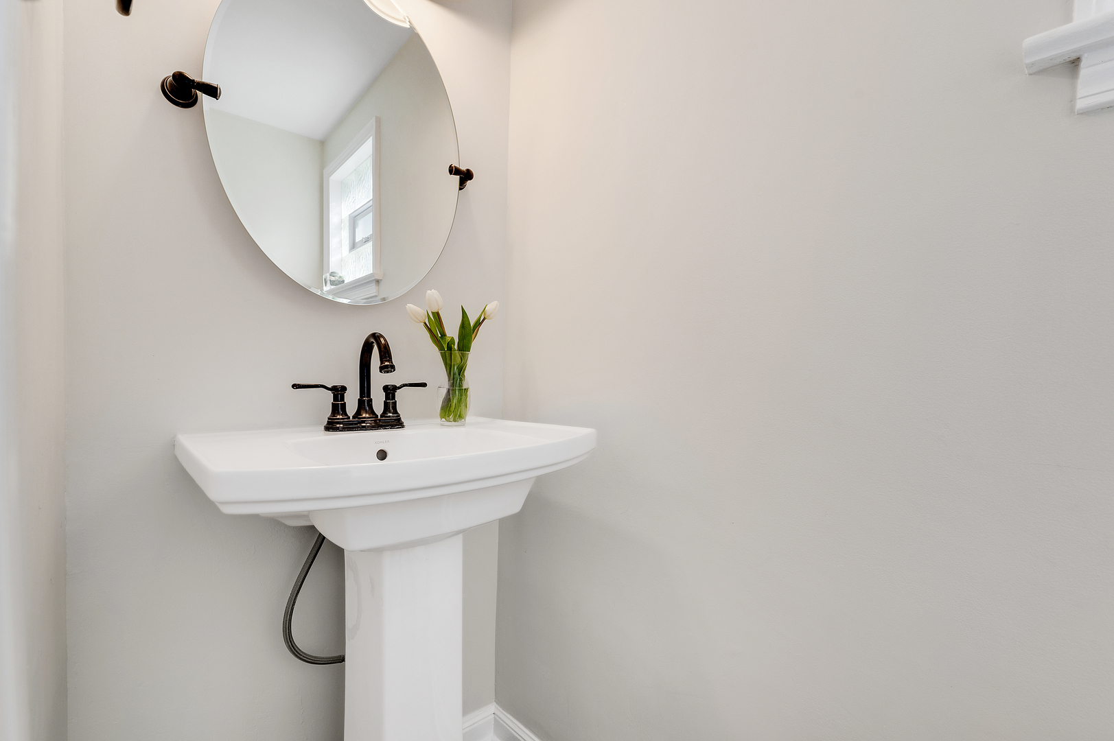 2309 2nd Avenue North Riverside, IL 60546 - Photo 13 of 22 a bathroom with a sink and mirror