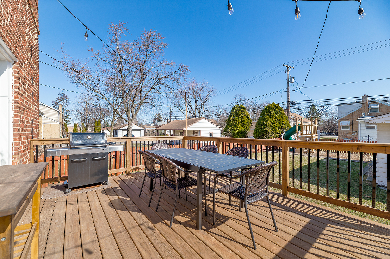 2309 2nd Avenue North Riverside, IL 60546 - Photo 20 of 22 a roof deck with table and chairs a barbeque with wooden floor