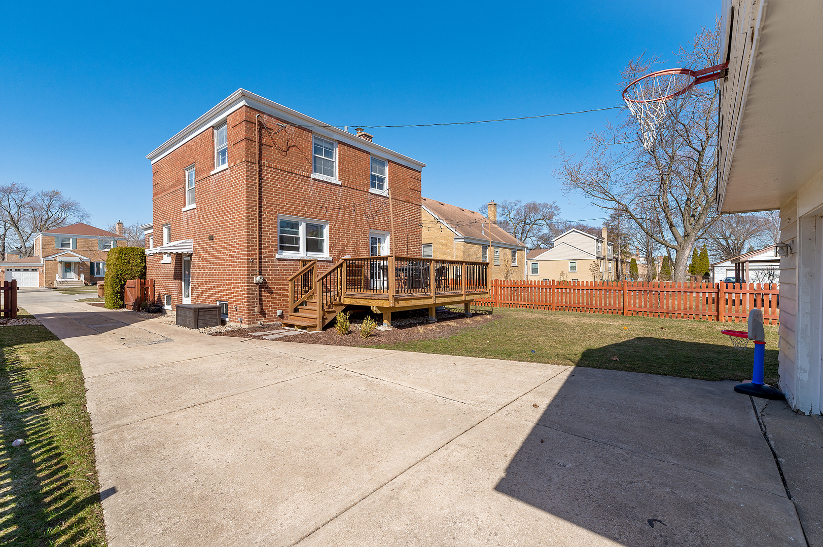 2309 2nd Avenue North Riverside, IL 60546 - Photo 22 of 22 a front view of a building with garden and trees