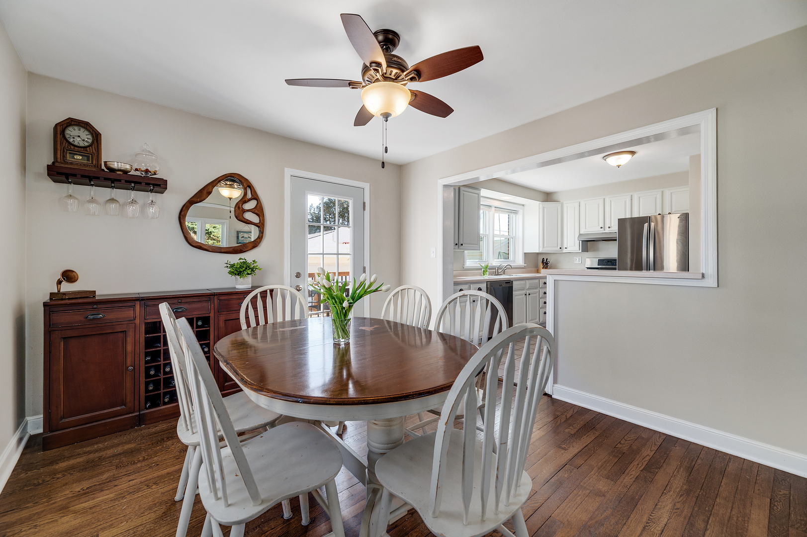 2309 2nd Avenue North Riverside, IL 60546 - Photo 7 of 22 a dining room with furniture a kitchen view and wooden floor