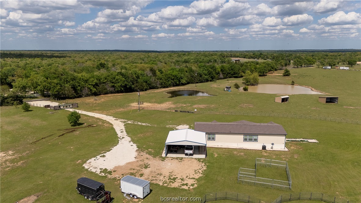 10976 Whiterock Road Bremond, TX 76629 - Photo 33 of 42 a view of a lake with a yard