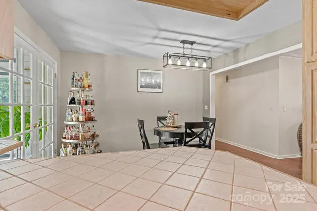 a view of a livingroom with furniture and a window