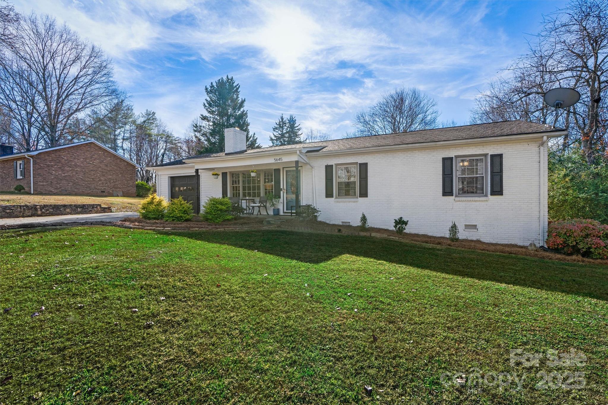 5645 Sandhurst Road Hickory, NC 28602 - Photo 2 of 46 a front view of house with yard and green space