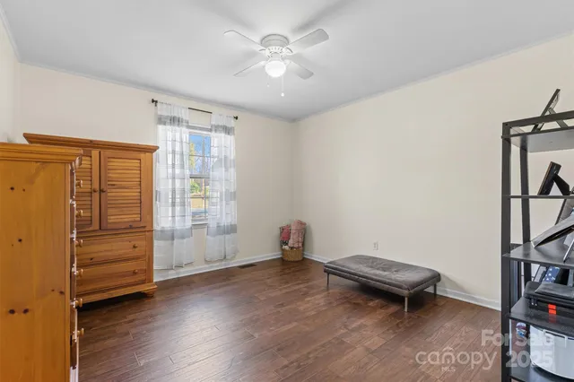 wooden floor and chair in a room