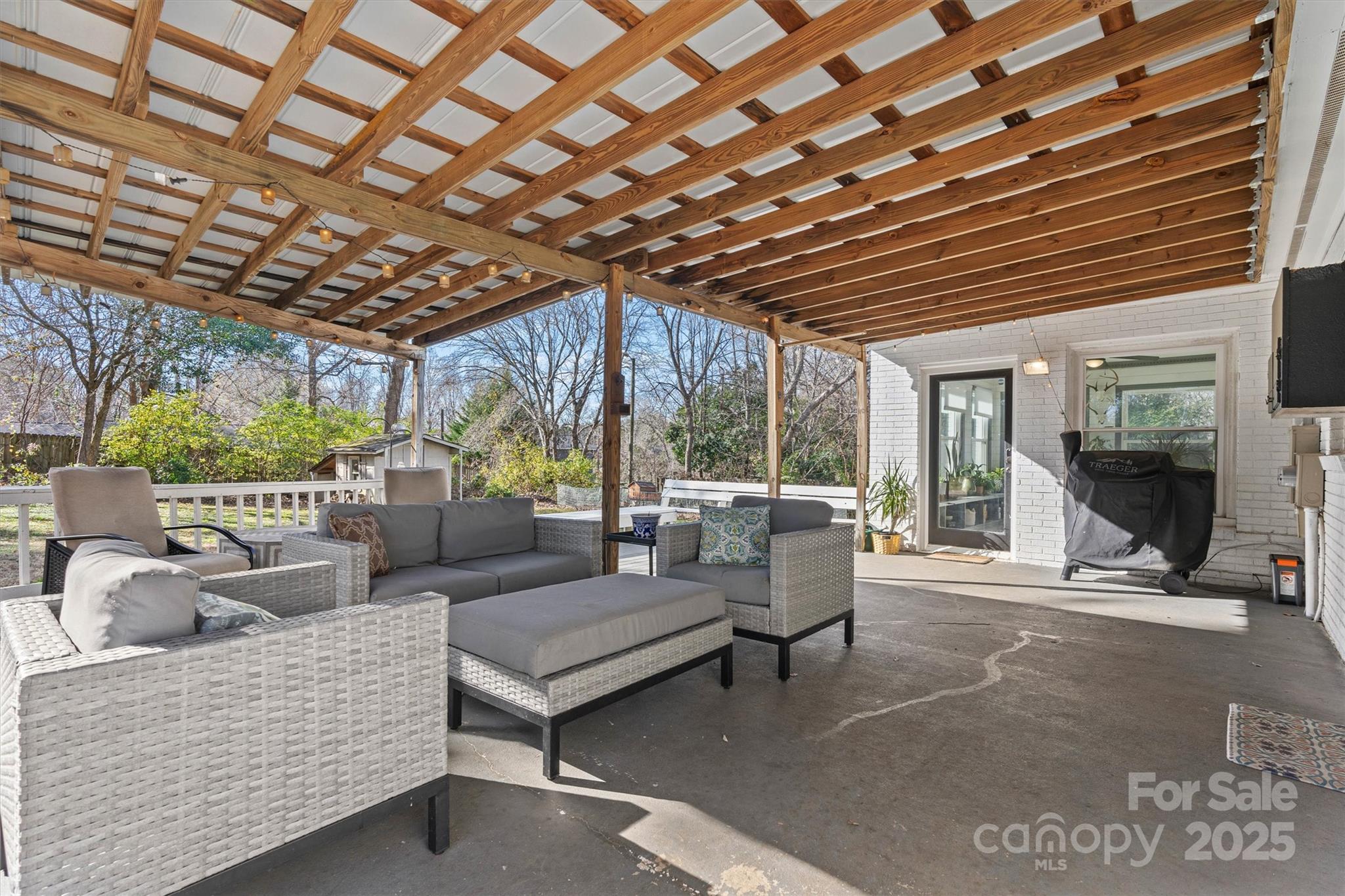 5645 Sandhurst Road Hickory, NC 28602 - Photo 31 of 46 a outdoor living space with patio furniture and a grill