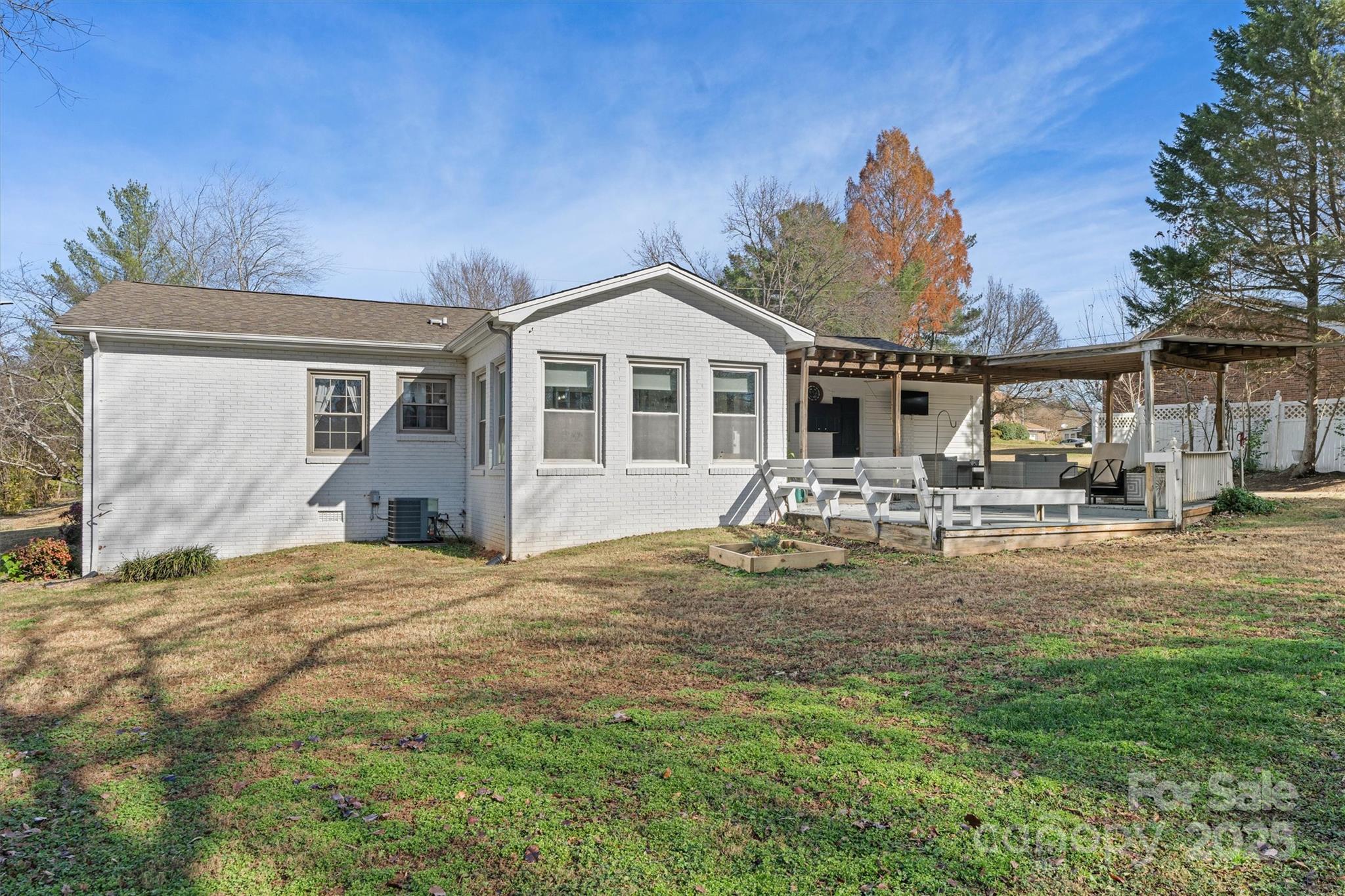 5645 Sandhurst Road Hickory, NC 28602 - Photo 37 of 46 a backyard of a house with table and chairs