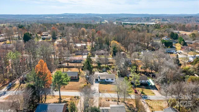 an aerial view of a city with lots of residential buildings