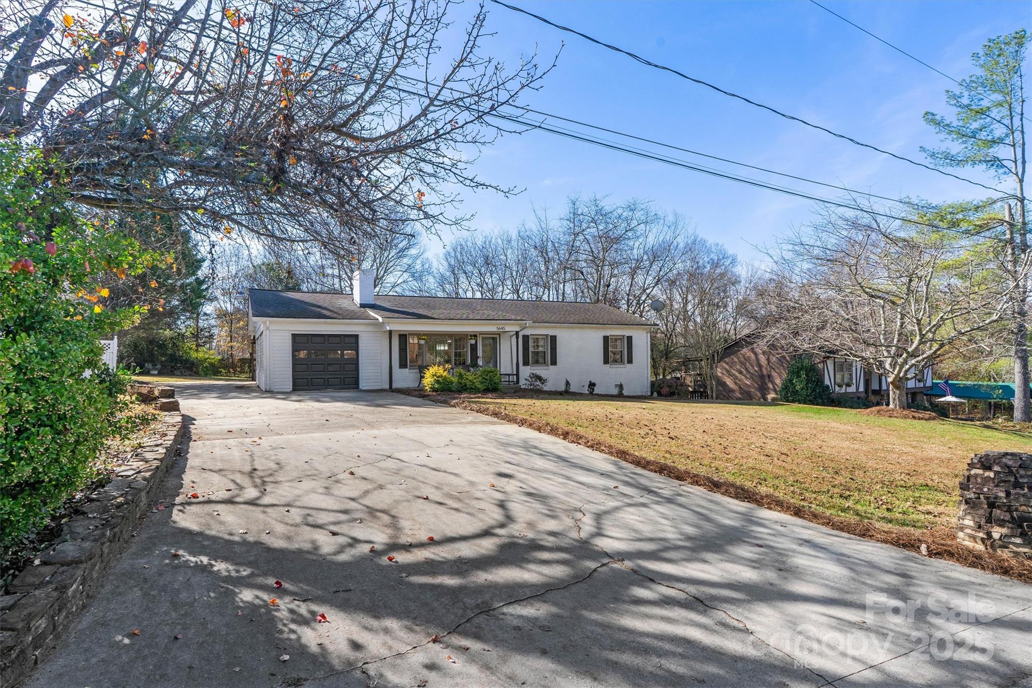 5645 Sandhurst Road Hickory, NC 28602 - Photo 46 of 46 a front view of house with yard and trees