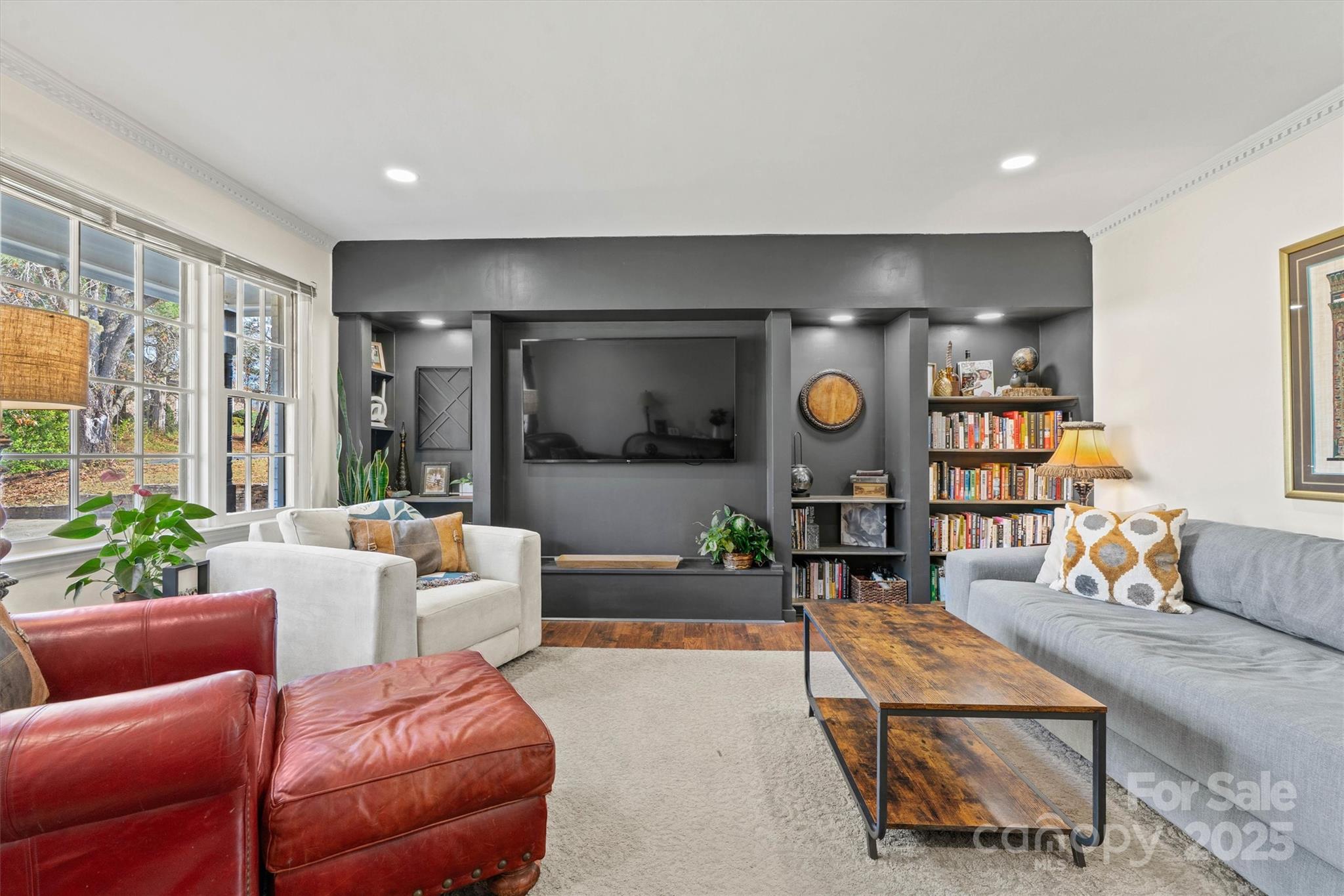 5645 Sandhurst Road Hickory, NC 28602 - Photo 5 of 46 a living room with furniture and a wooden floor