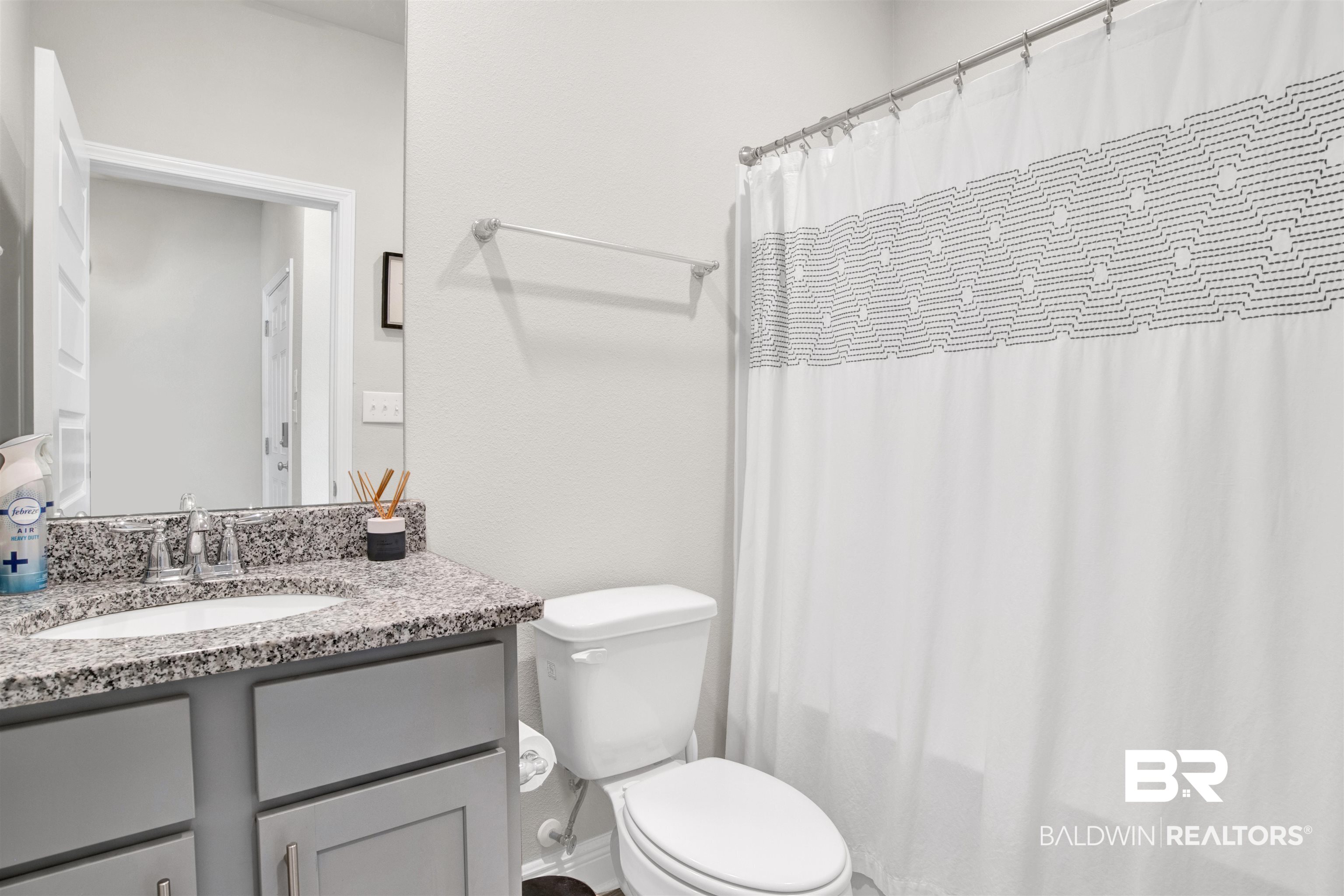 24253 Alydar Loop Daphne, AL 36526 - Photo 25 of 44 Bathroom featuring vanity and shower / bathtub combination with curtain