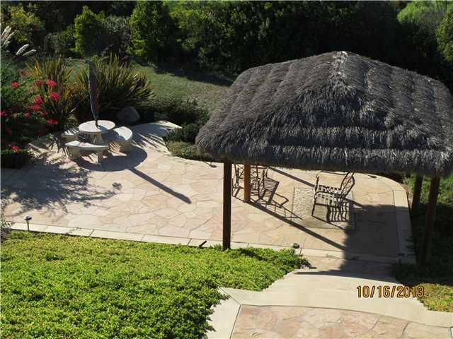 4221 Fallsbrae Road Fallbrook, CA 92028 - Photo 15 of 21 Looking down on one custom palapa - covered sitting area.