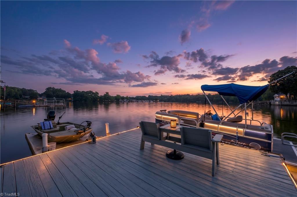 2113 Warf Road Lexington, NC 27292 - Photo 1 of 50 Lakefront home on High Rock Lake with a private dock and seating on floater.