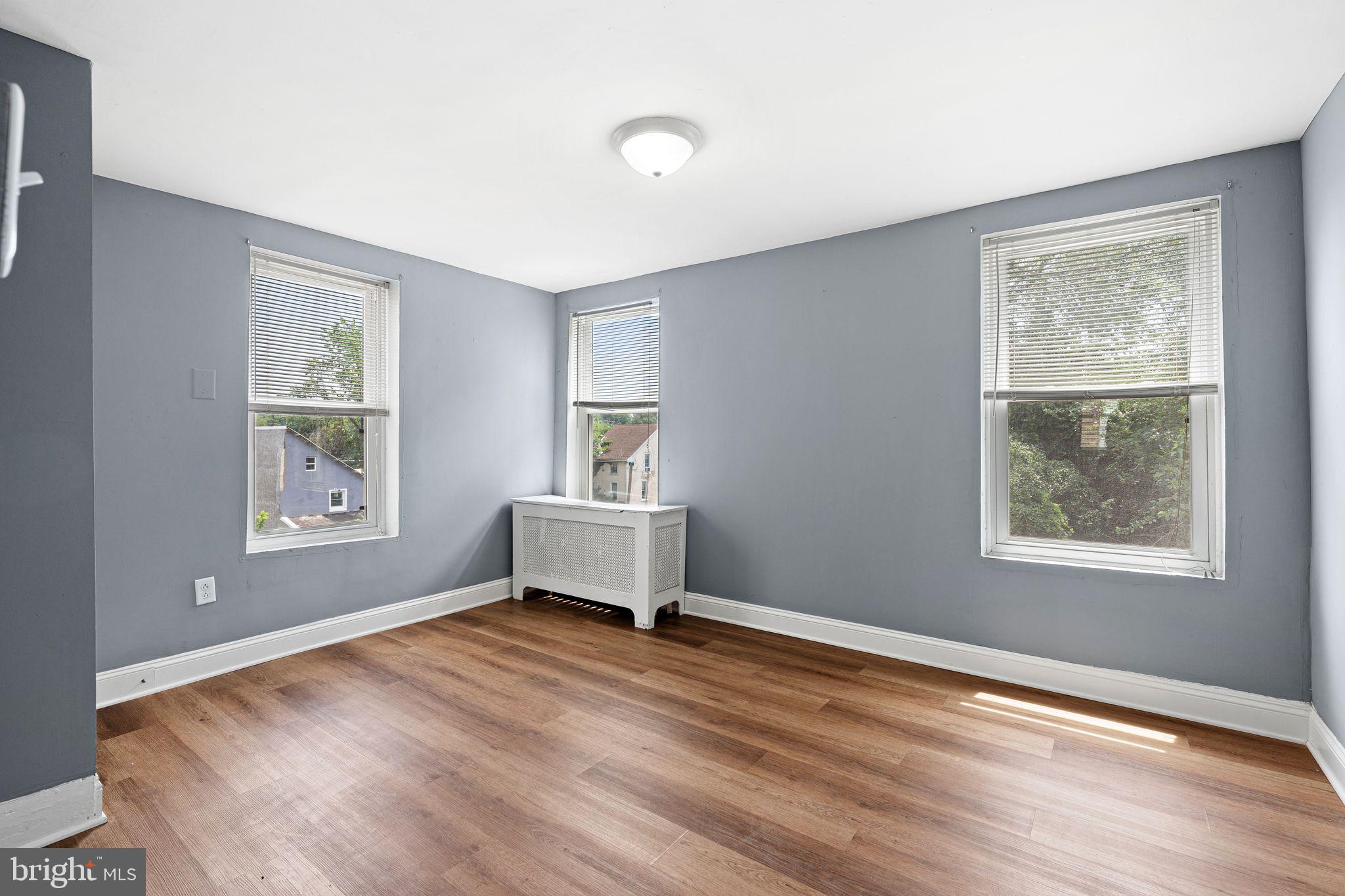 452 Mechanic Street Philadelphia, PA 19144 - Photo 14 of 32 a view of room with window and wooden floor