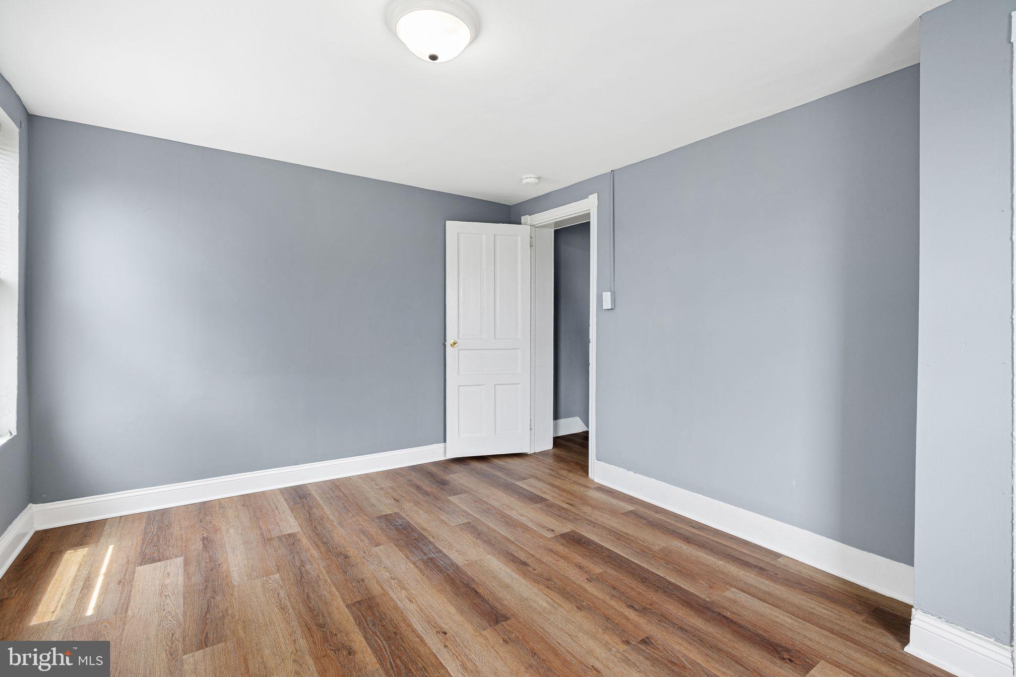 452 Mechanic Street Philadelphia, PA 19144 - Photo 15 of 32 a view of an empty room with wooden floor