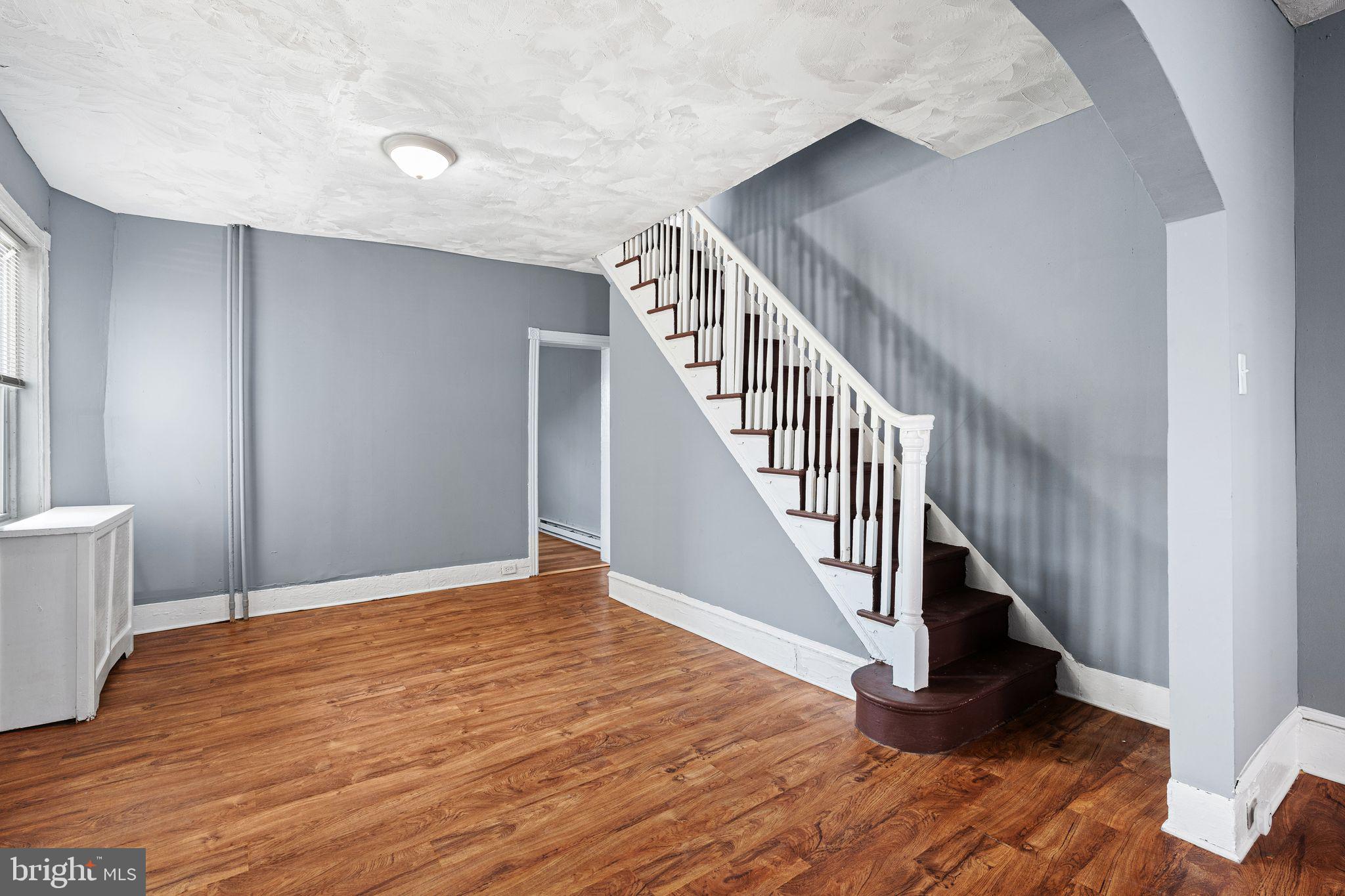 452 Mechanic Street Philadelphia, PA 19144 - Photo 2 of 32 a view of an entryway with wooden floor