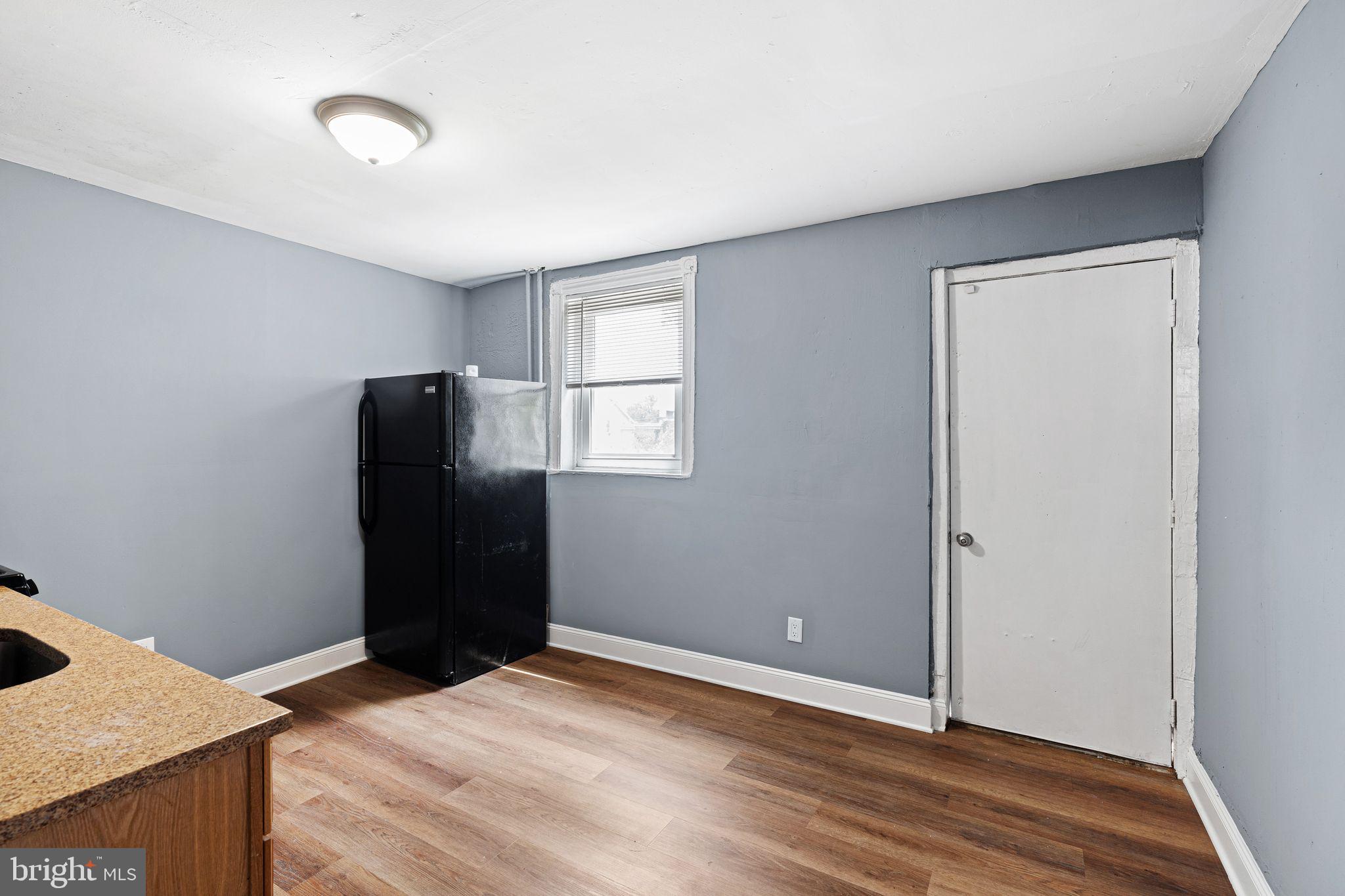 452 Mechanic Street Philadelphia, PA 19144 - Photo 8 of 32 a view of empty room with window and refrigerator