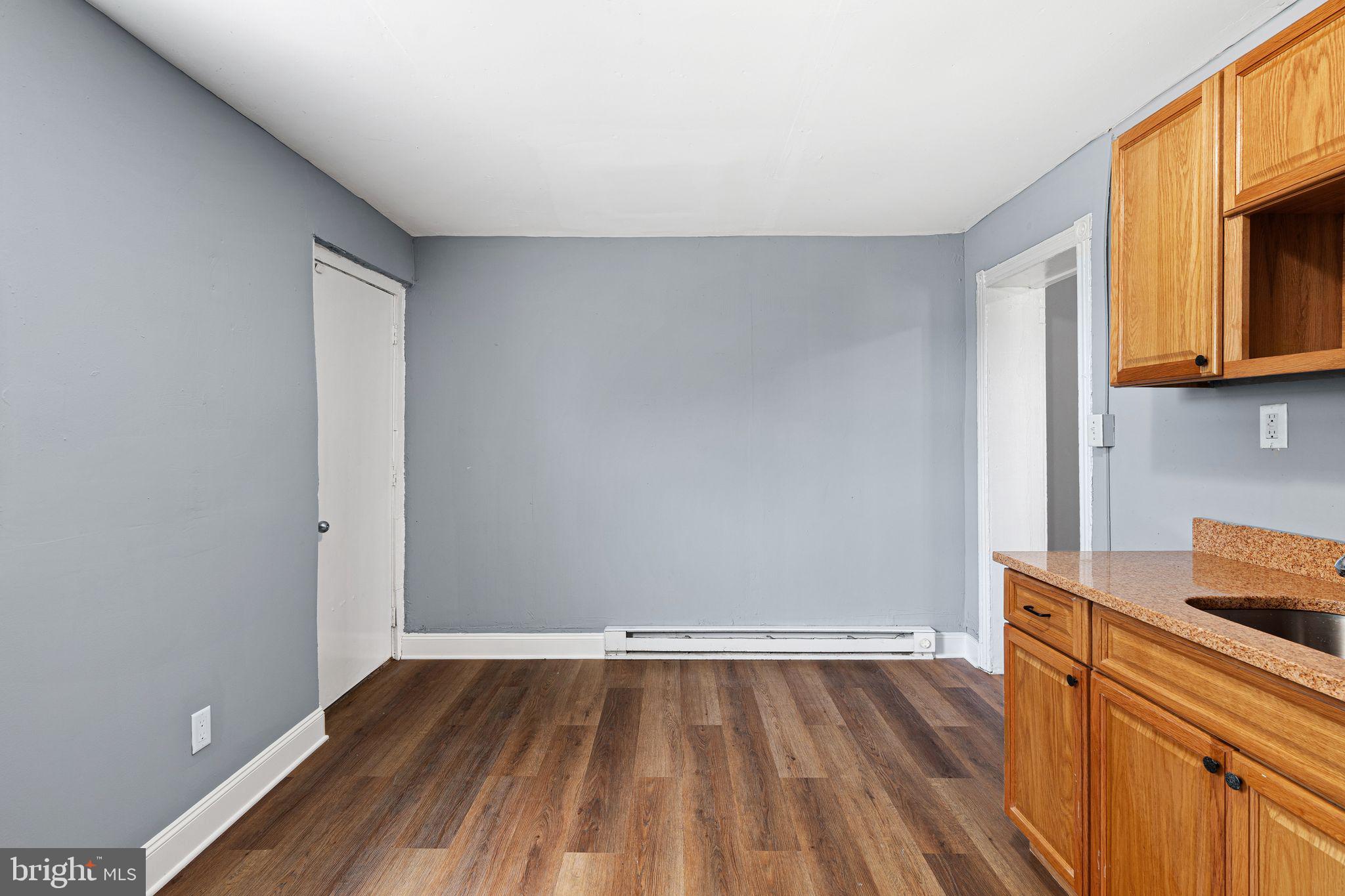 452 Mechanic Street Philadelphia, PA 19144 - Photo 9 of 32 a view of storage and utility room in wooden floor