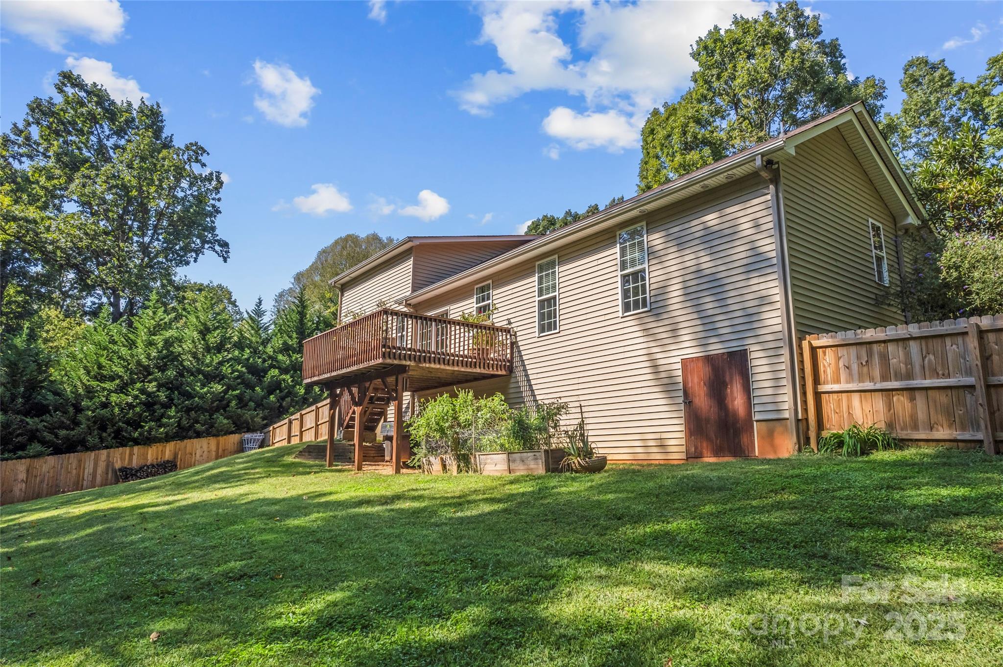 2775 Beechwood Road Denver, NC 28037 - Photo 28 of 33 a view of backyard of house with green space