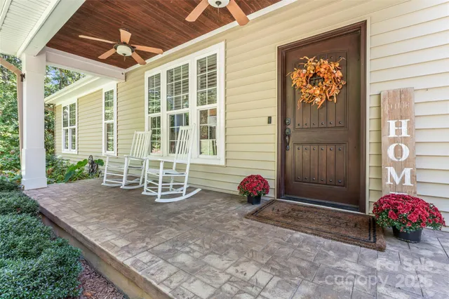 a backyard of a house with seating space