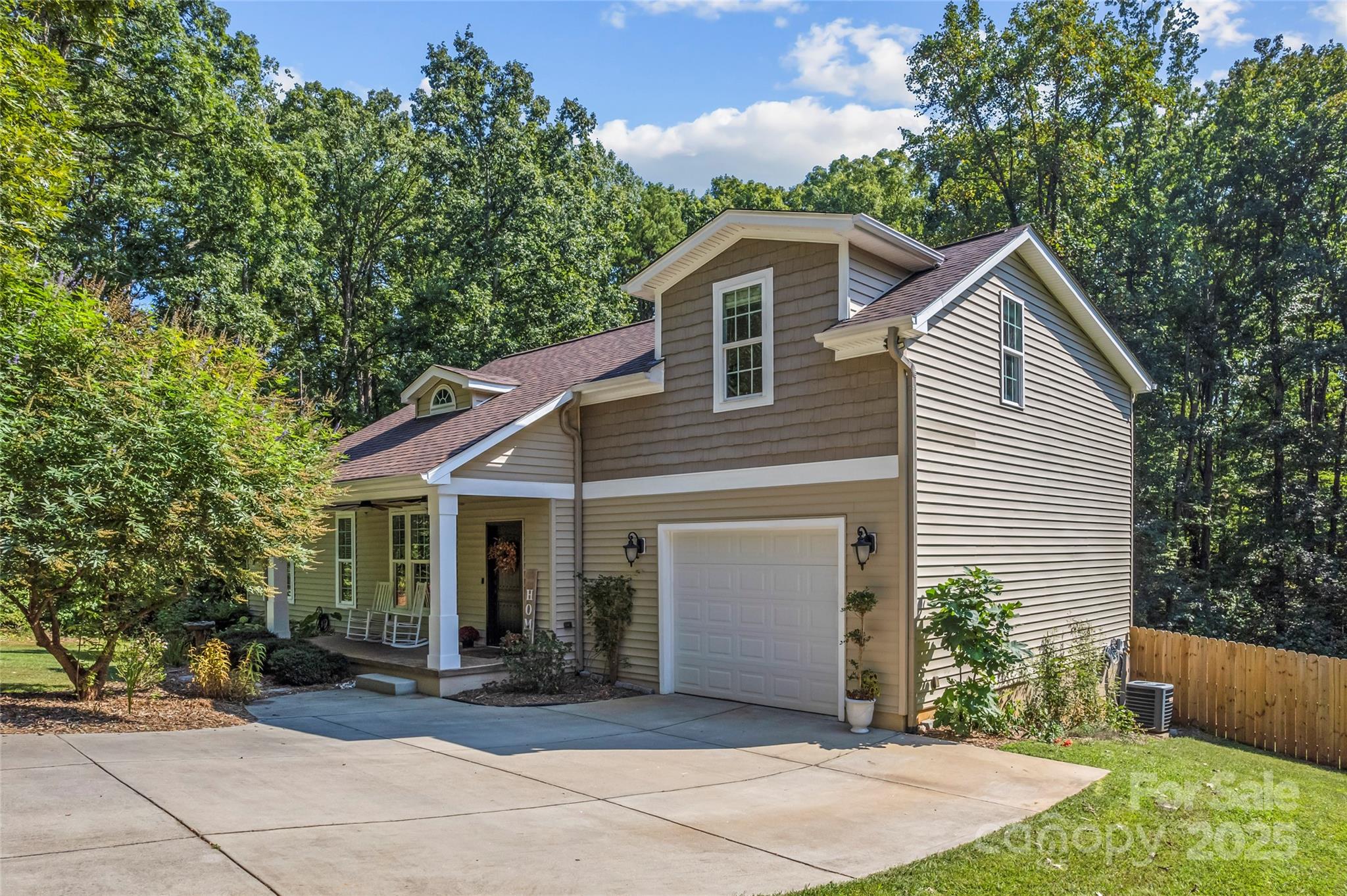2775 Beechwood Road Denver, NC 28037 - Photo 32 of 33 a front view of a house with garden