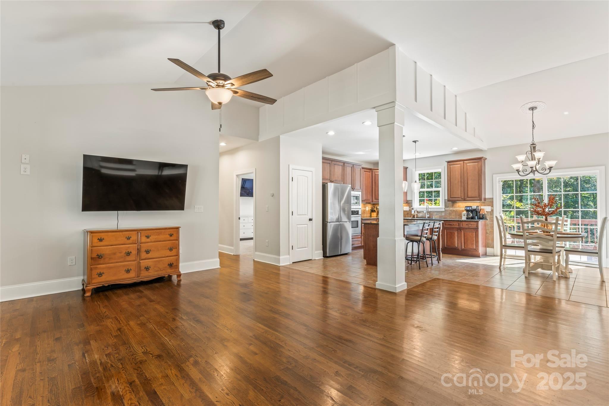2775 Beechwood Road Denver, NC 28037 - Photo 7 of 33 a view of a livingroom with furniture wooden floor and windows