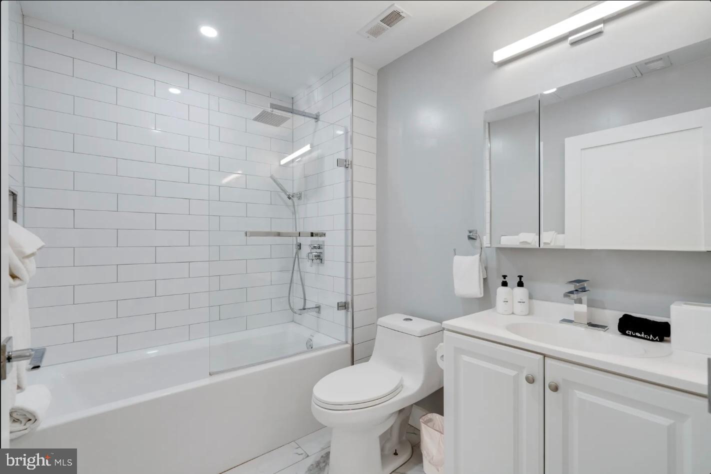 150 South Independence Mall West, Unit 1013 Philadelphia, PA 19106 - Photo 14 of 16 a bathroom with a sink toilet and shower