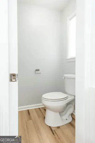 a kitchen with stainless steel appliances granite countertop a refrigerator stove and sink