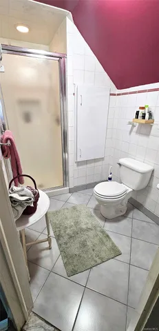 a view of a bathroom with a sink and glass door