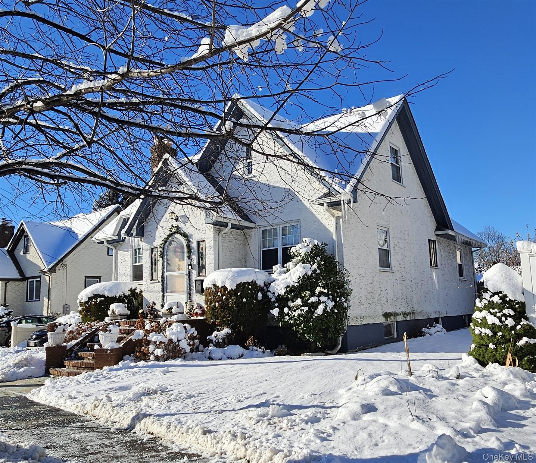 80 Dobson Avenue Merrick, NY 11566 - Photo 3 of 21 a front view of a house