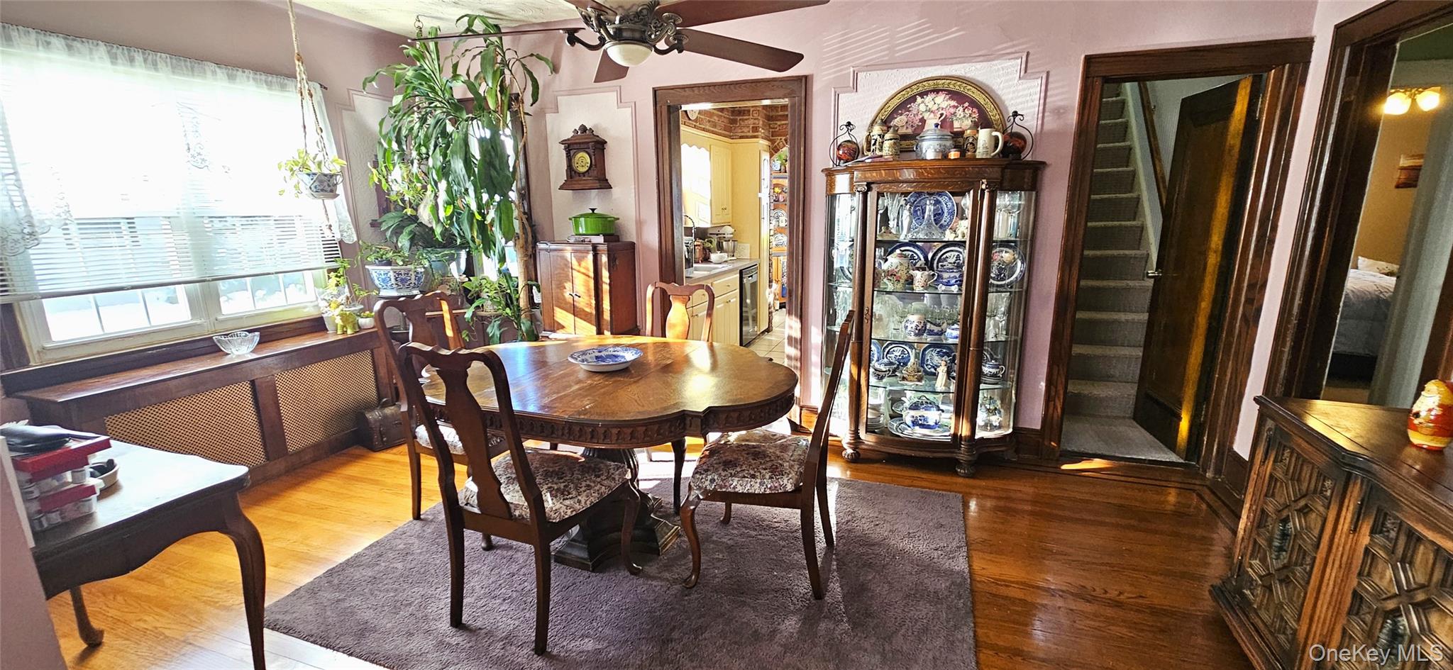 80 Dobson Avenue Merrick, NY 11566 - Photo 9 of 21 a view of a dining room with furniture window and wooden floor