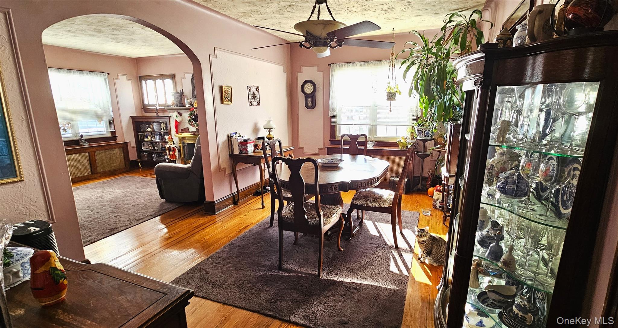 80 Dobson Avenue Merrick, NY 11566 - Photo 10 of 21 a view of a dining room with furniture window and wooden floor